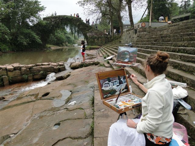 Daughter Kelsey
                                                  painting in Shangli